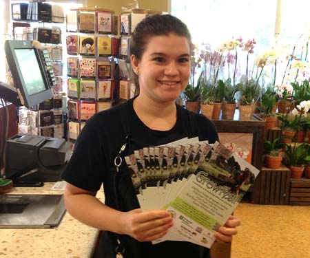 Dejah, a customer service cashier, did her part to set out flyers at each cash register at the South Beach store.