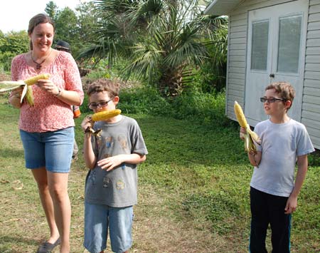 Sheryl and her two boys, attending Farm Day 2013, at Bee Heaven Farm.